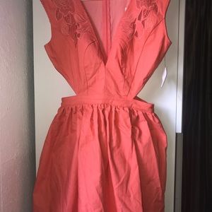 Brand new cocktail salmon colored dress.